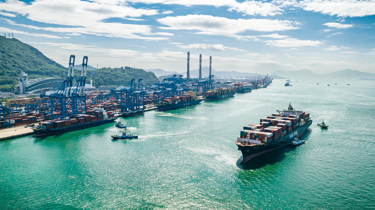 A container vessel leaving the wharf of Qianhai