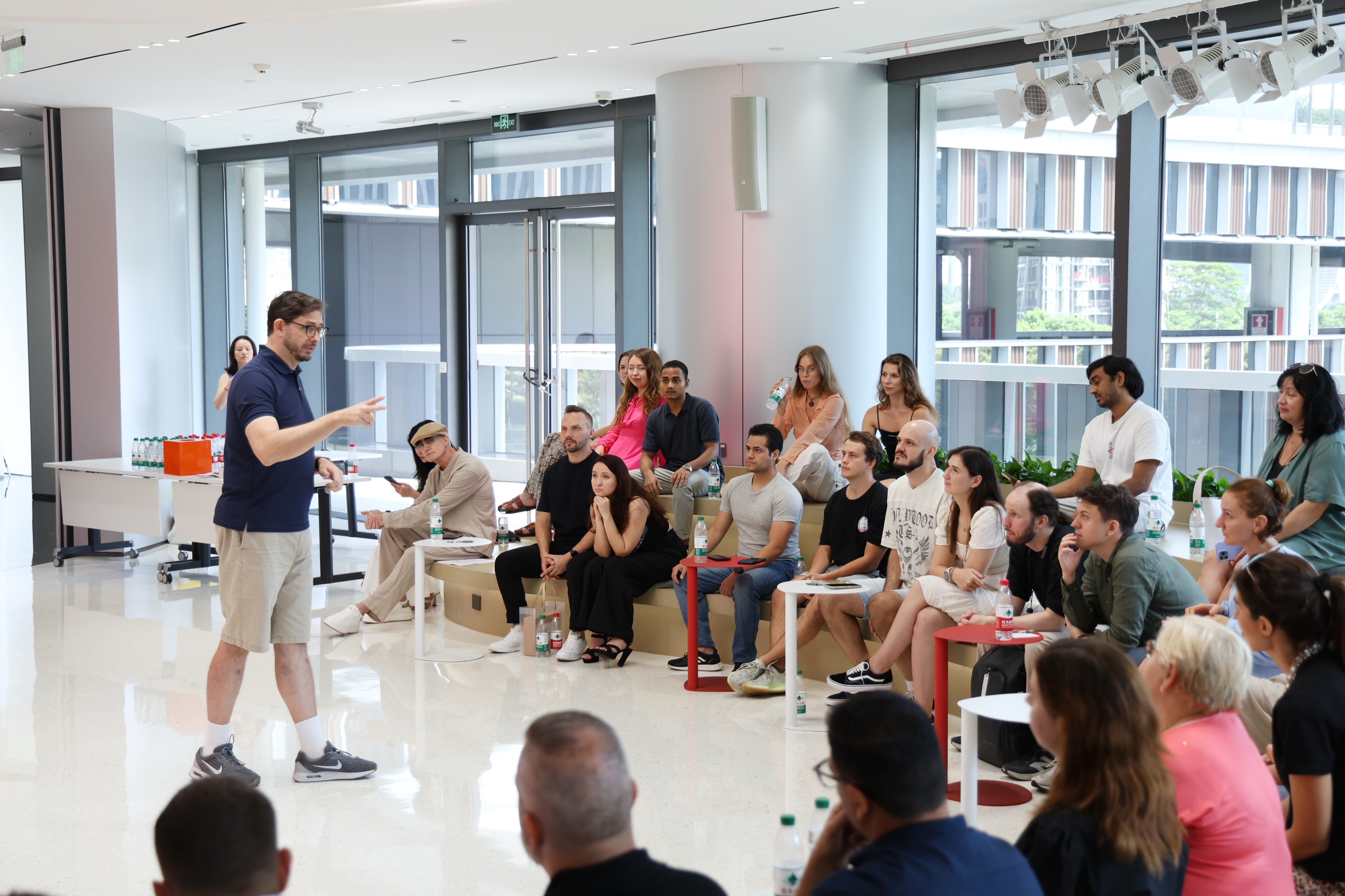 John Dorris shares insights at an international story sharing session in Qianhai this August. Zhen Jianhong..JPG